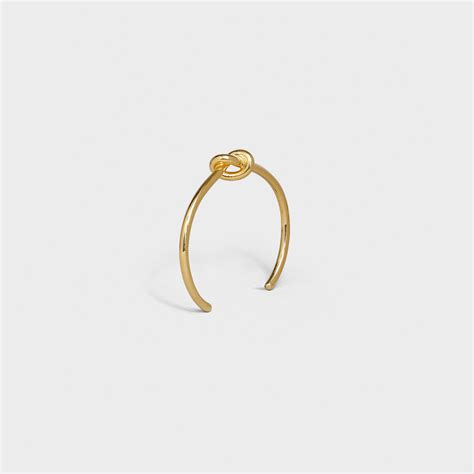 women celine knot extra-thin bracelet in brass